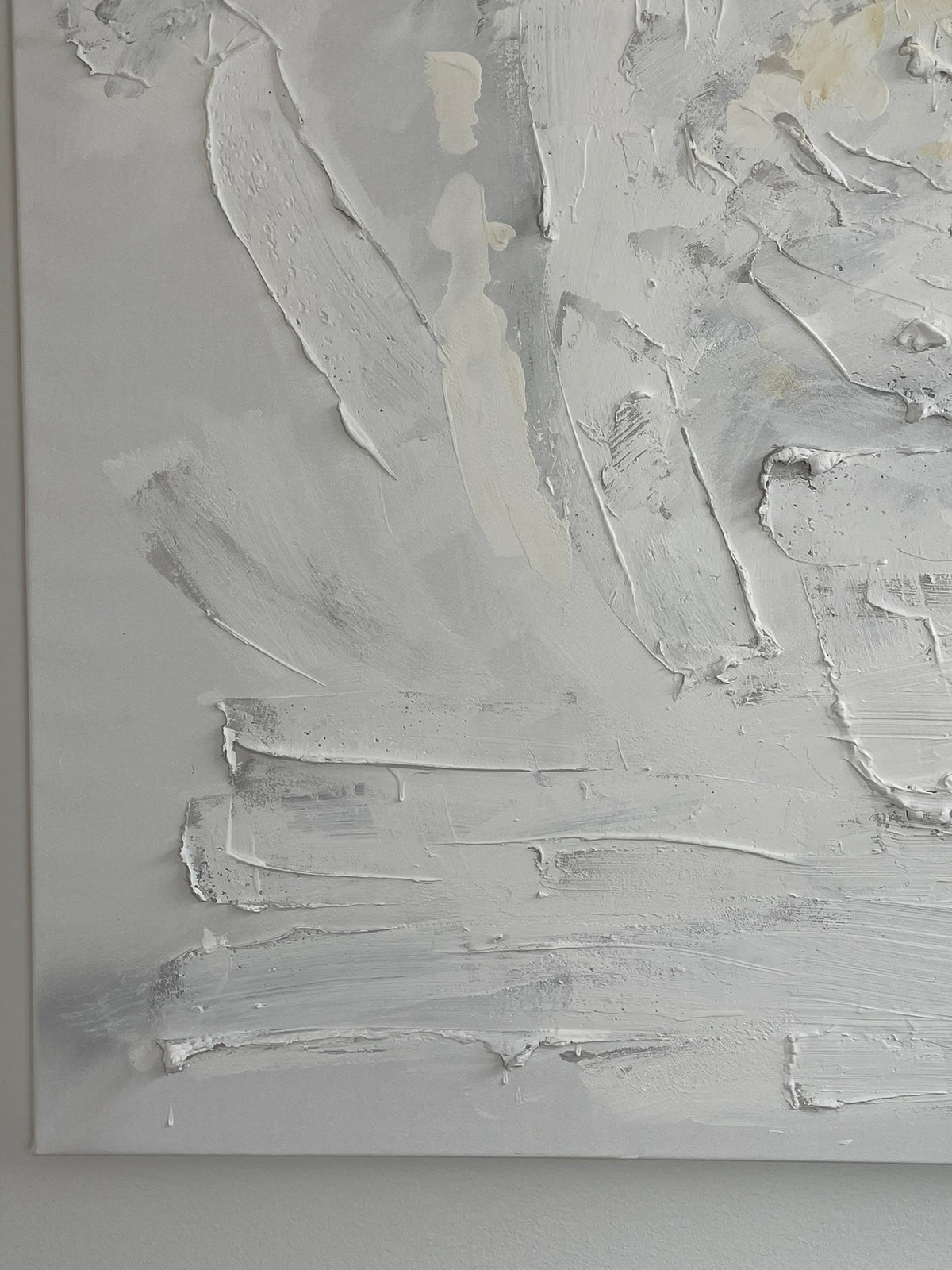 Close-up of Quiet Harmony original abstract painting by Victoria Lorenz, showing layered white, ivory and soft grey textured brushstrokes