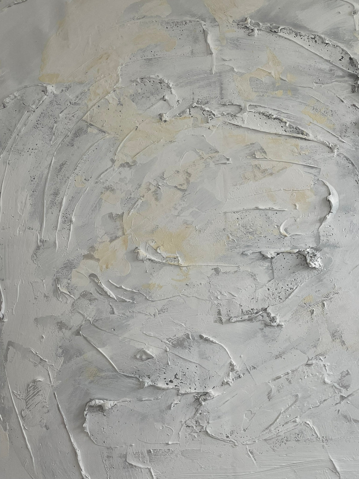 Close-up of Quiet Harmony original abstract painting with thick textured brushstrokes in soft ivory, light grey, beige and subtle golden tones.