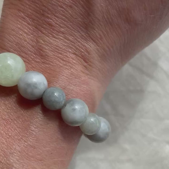 Video showing the Ocean Calm natural gemstone bracelet worn on the wrist, highlighting its colours and natural gemstone texture.