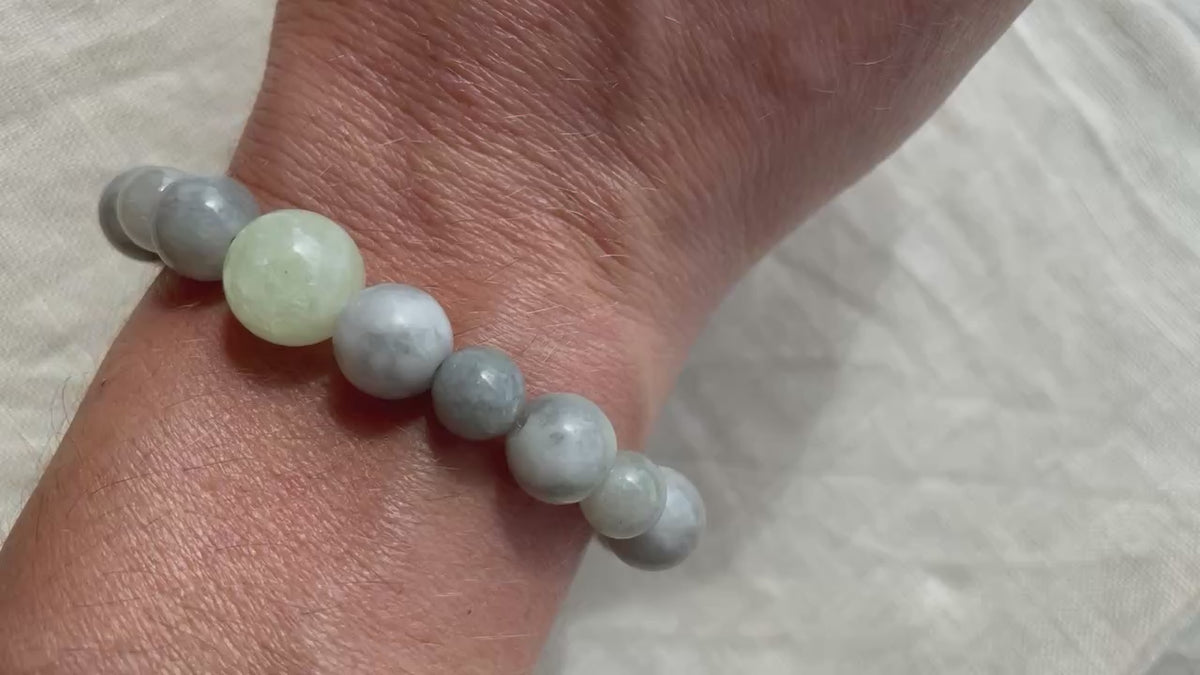 Video showing the Ocean Calm natural gemstone bracelet worn on the wrist, highlighting its colours and natural gemstone texture.