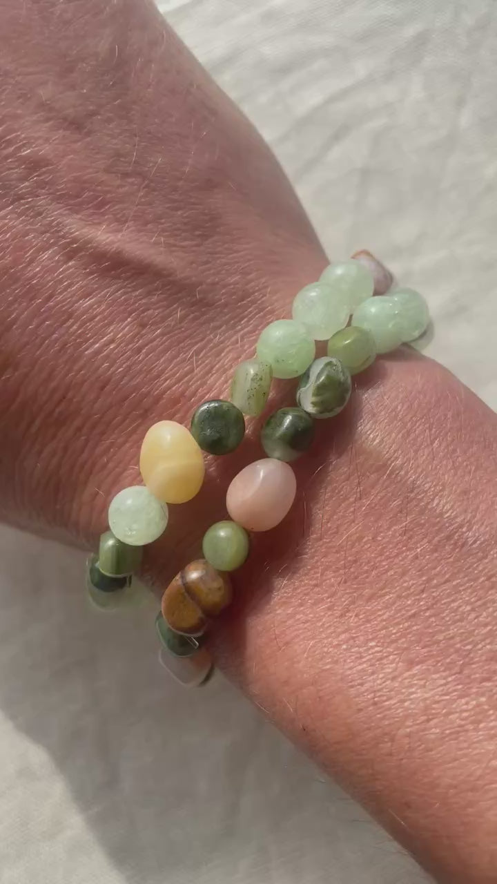Video showing the Forest Garden natural gemstone bracelet worn on the wrist, highlighting its soft green, white and earthy tones.