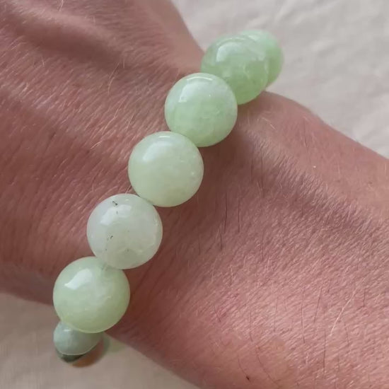 Video showing the handmade Green Harmony natural gemstone bracelet with soft green and blue-green gemstones.