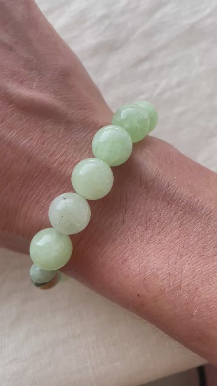 Video showing the handmade Green Harmony natural gemstone bracelet with soft green and blue-green gemstones.