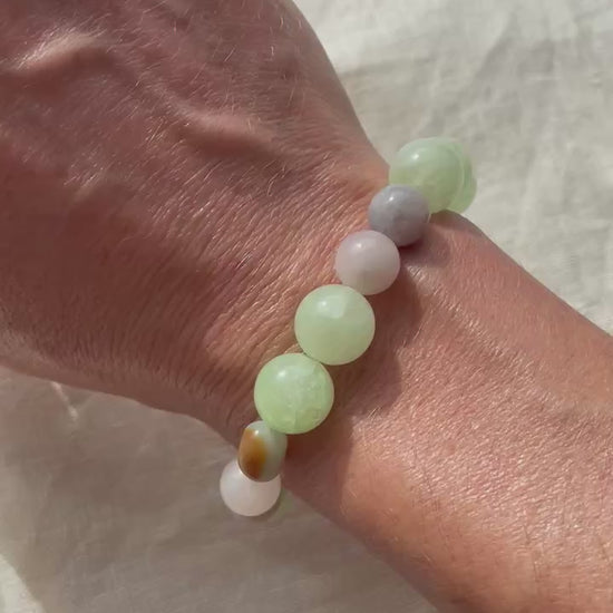 Video showing the Soft Green Harmony natural gemstone bracelet worn on the wrist.