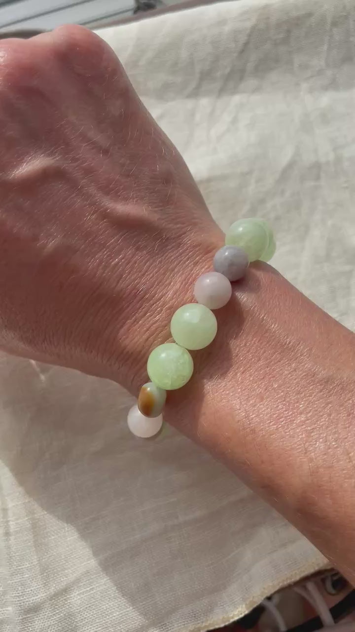 Video showing the Soft Green Harmony natural gemstone bracelet worn on the wrist.
