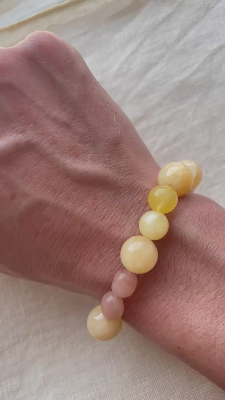 Video showing the handmade Golden Sunrise natural gemstone bracelet and its warm golden, honey and peach tones.
